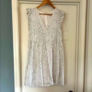 White Sleeveless Dress with Black Pattern